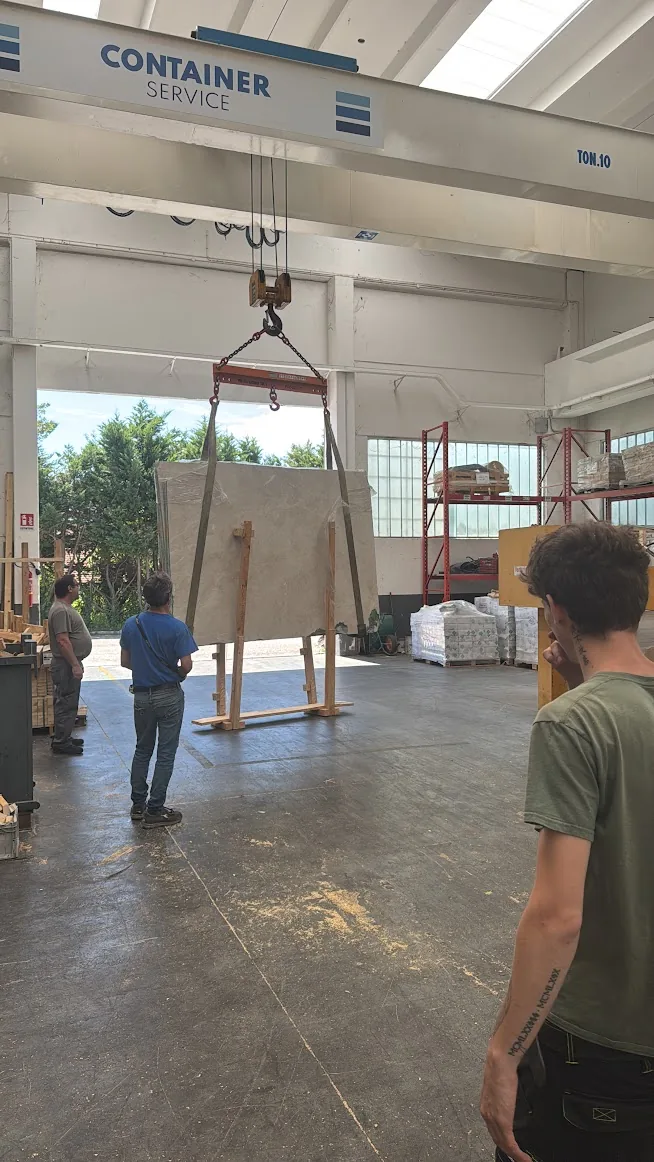 Stone loaded into container for U.S. delivery