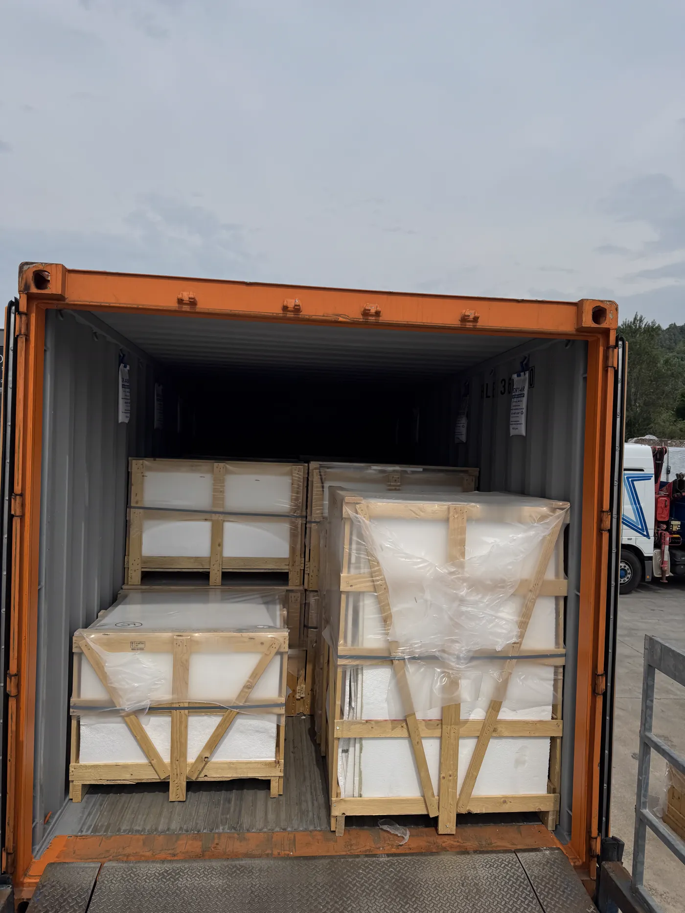 20 ft container loaded front to back with crated stone