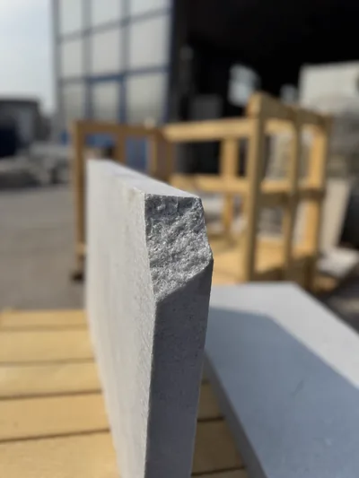 Close-up of a stone coping with a split rockface edge