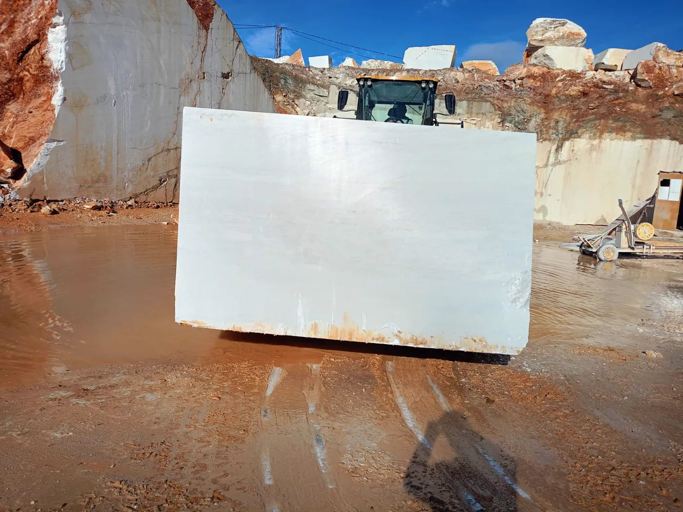 White stone block screened at the source before production