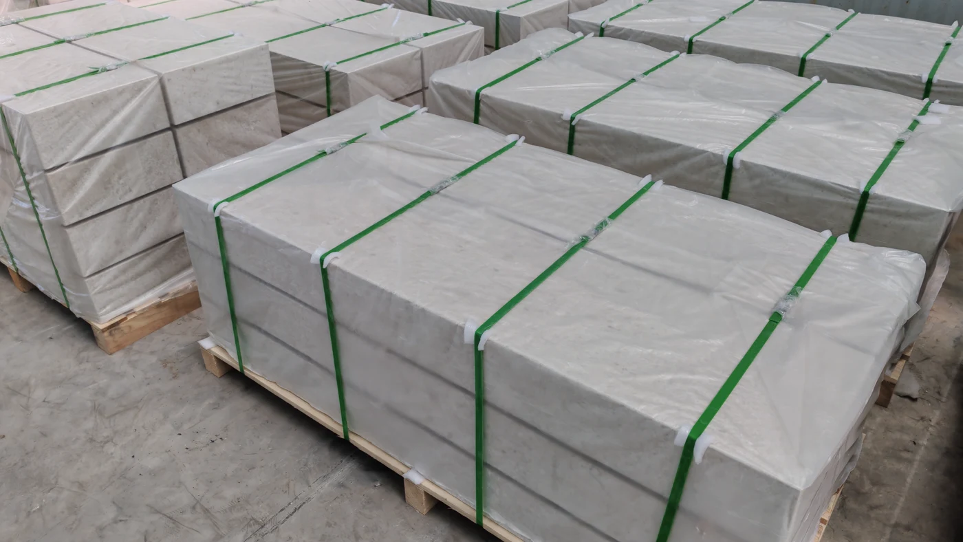 Stone units film wrapped and strapped on pallets, staged for loading