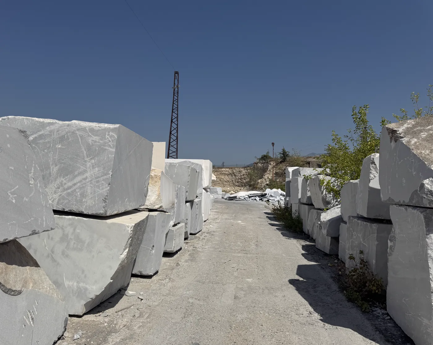 Walking the corridor between rows of grey marble blocks